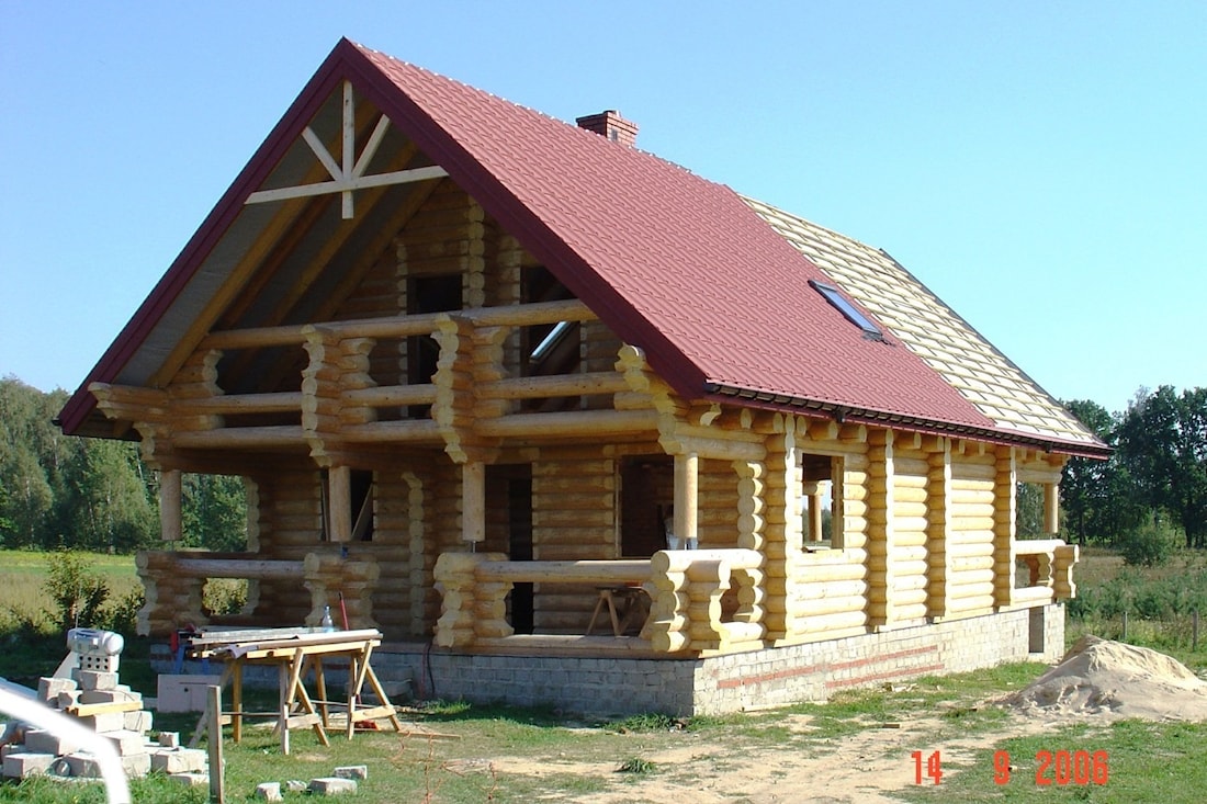 Maison en bois rond superficie de 166 m²