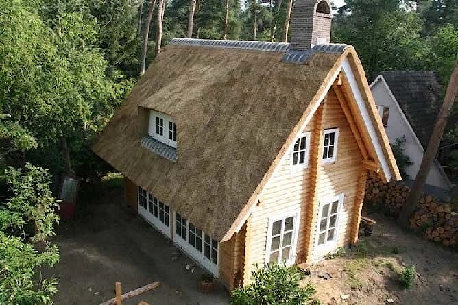 Maison en bois rond superficie 107 m²  